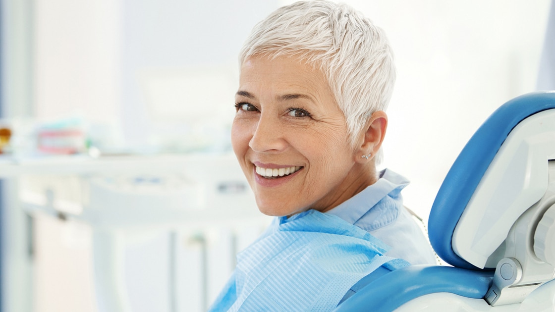 Smiling Patient At Dentist Photo 2